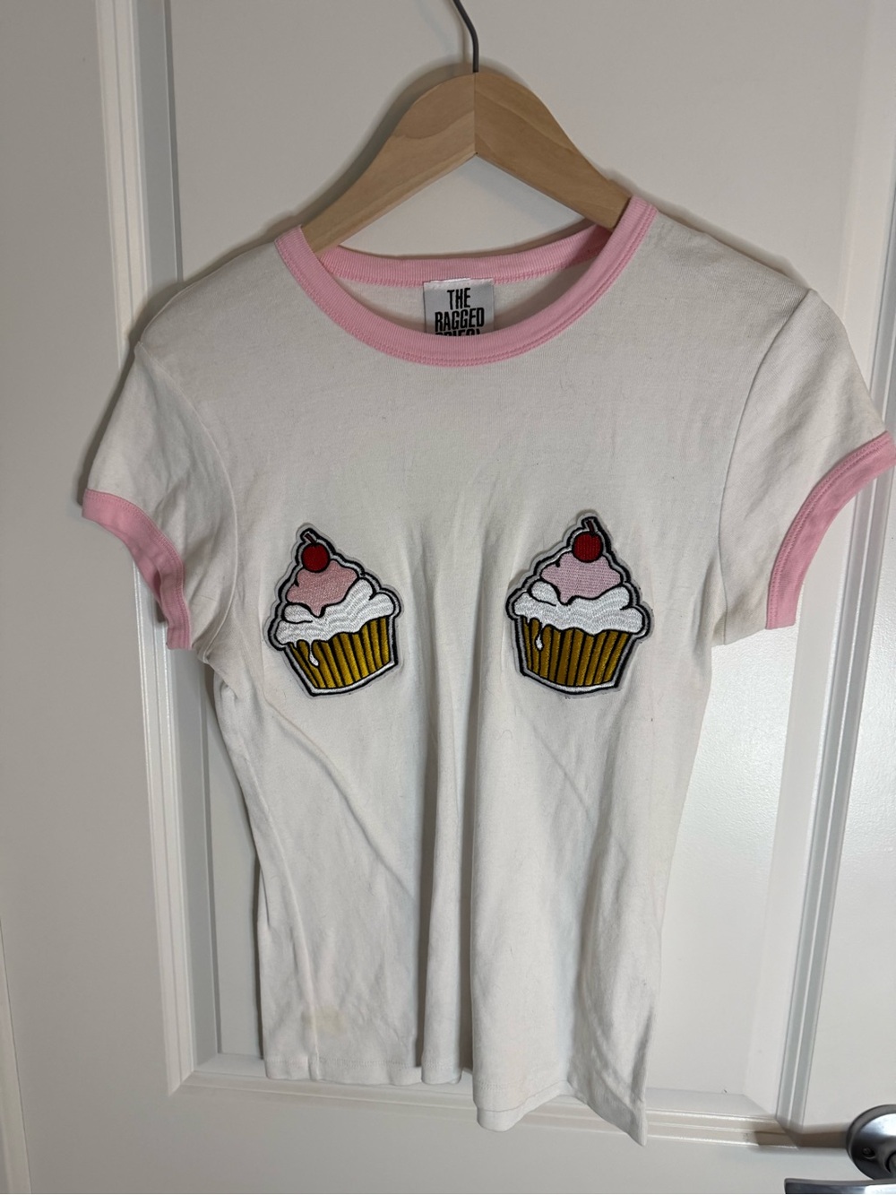 The Ragged Priest White Tee with Pink Trim & Cupcake Patches